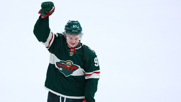 Mar 16, 2022; Saint Paul, Minnesota, USA; Minnesota Wild left wing Kirill Kaprizov (97) acknowledges the crowd after the game against the Boston Bruins at Xcel Energy Center. Mandatory Credit: Harrison Barden-USA TODAY Sports