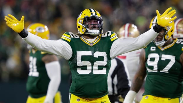 Green Bay Packers outside linebacker Rashan Gary (52) celebrates a fumble against the San Francisco 49ers in the second quarter during their NFL divisional round football playoff game Saturday January...