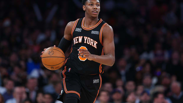 New York Knicks guard RJ Barrett (9) dribbles up court during the second half against the Atlanta Hawks at Madison Square Garden.