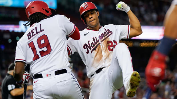 Washington Nationals’ Juan Soto, right, celebrates with Josh Bell after his solo home run during the fourth inning of a baseball game against the New York Mets at Nationals Park, Monday, Aug. 1, 2022, in Washington.