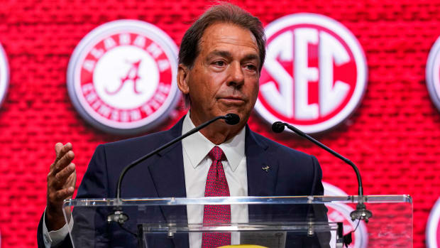 Alabama head coach Nick Saban speaks on the stage during the SEC Media Days.