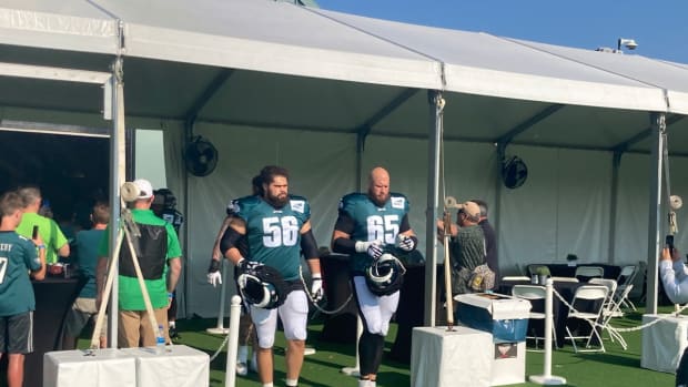 Isaac Seumalo (lef) and Lane Johnson take the practice field on Aug. 4, 2022