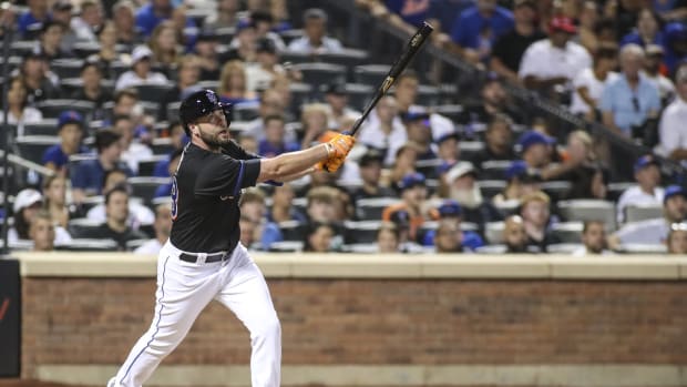Aug 5, 2022; New York City, New York, USA; New York Mets pinch hitter Darin Ruf (28) hits a two run double in the fifth inning against the Atlanta Braves at Citi Field.