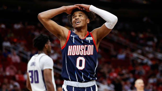 Rockets guard Jalen Green (0) puts his hands on his head in disbelief after a play during the third quarter of a game against the Kings.