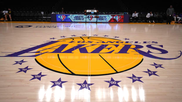 A close-up view of the Lakers logo at center court before a game against the 76ers.