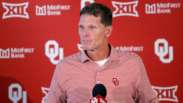 Oklahoma head football coach Brent Venables speaks to reporters during media day.