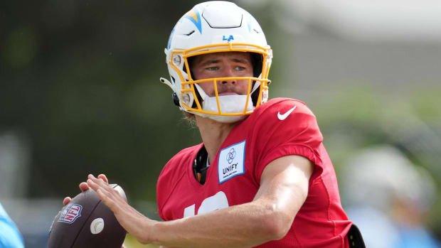 Aug 1, 2022; Costa Mesa, CA, USA; Los Angeles Chargers quarterback Justin Herbert (10) throws the ball during training camp at the Jack Hammett Sports Complex.