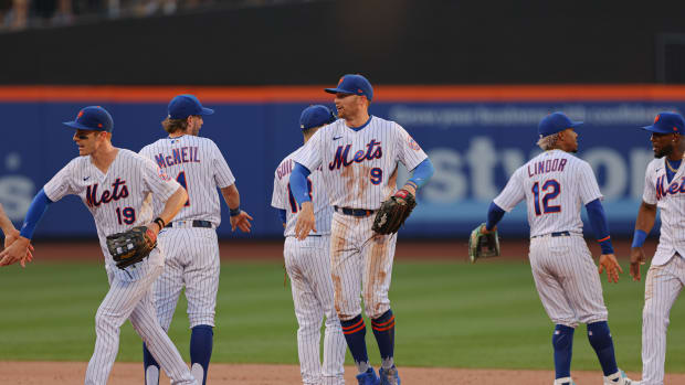 Aug 7, 2022; New York City, New York, USA; New York Mets center fielder Brandon Nimmo (9) celebrates with teammates after the game against the Atlanta Braves at Citi Field.