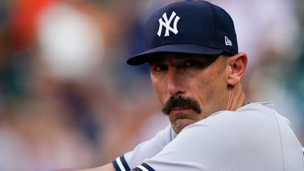 New York Yankees Matt Carpenter looks on from dugout