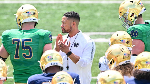 Apr 23, 2022; Notre Dame, Indiana, USA; Notre Dame Fighting Irish head coach Marcus Freeman watches warmups before the Blue-Gold Game at Notre Dame Stadium.