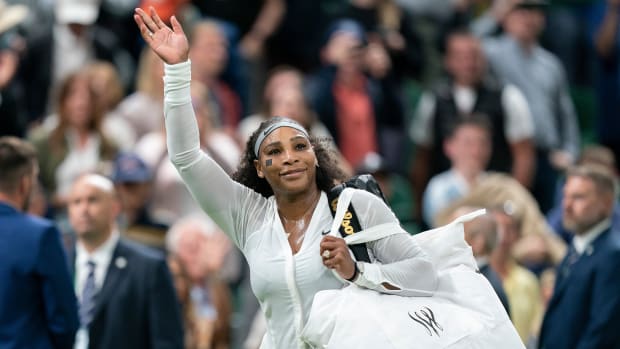Serena Williams (USA) leaves the court after her first-round match against Harmony Tan (FRA) on Day 2 of 2022 Wimbledon.