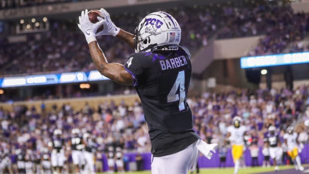 Oct 23, 2021; Fort Worth, Texas, USA; TCU Horned Frogs wide receiver Taye Barber (4) catches a pass for a touchdown during the second quarter against the West Virginia Mountaineers at Amon G. Carter Stadium.