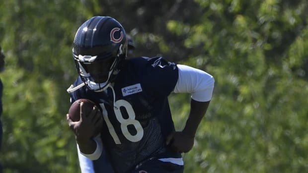 David Moore hauls in a pass at training camp. The former Seahawks receiver is now among the growing list of wounded Bears receivers.