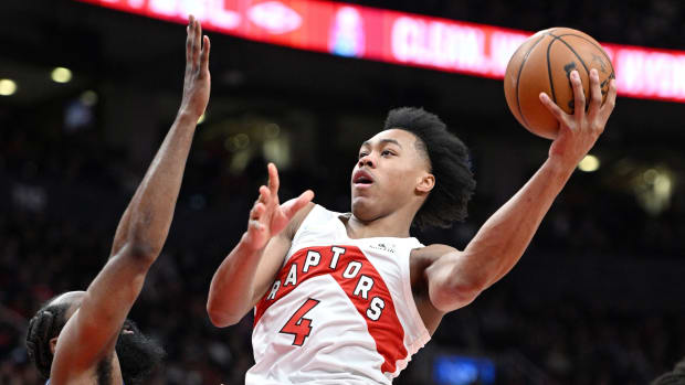 Toronto Raptors forward Scottie Barnes (4) shoots the ball against the Philadelphia 76ers in the second half during game six of the first round for the 2022 NBA playoffs at Scotiabank Arena.