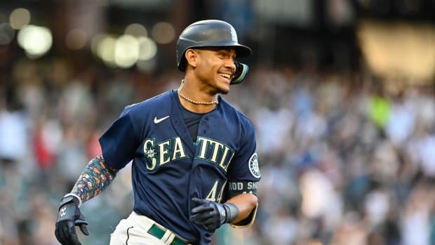 Seattle Mariners OF Julio Rodriguez smiles after hitting home run