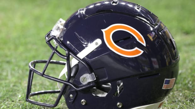 A Chicago Bears helmet on the field.