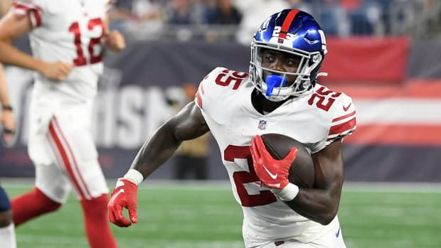 Aug 11, 2022; Foxborough, Massachusetts, USA; New York Giants running back Jashaun Corbin (25) runs after a catch during the second half of a preseason game against the New England Patriots at Gillette Stadium.
