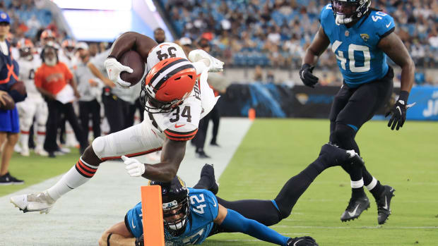 Cleveland Browns running back Jerome Ford (34) is shoved out of bounds by Jacksonville Jaguars safety Andrew Wingard (42) at the 2-yard line during the second quarter of a preseason NFL game Friday, Aug. 12, 2022 at TIAA Bank Field in Jacksonville. [Corey Perrine/Florida Times-Union] Jacksonville Jaguars 2022 Cleveland Browns First Home Pre Season Scrimmage Second Scrimmage Preseason