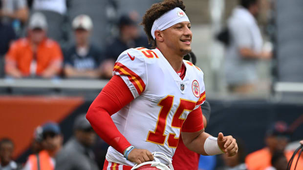 Aug 13, 2022; Chicago, Illinois, USA; Kansas City Chiefs quarterback Patrick Mahomes (15) heads off the field after warming up before a game against the Chicago Bears at Soldier Field. Mandatory Credit: Jamie Sabau-USA TODAY Sports