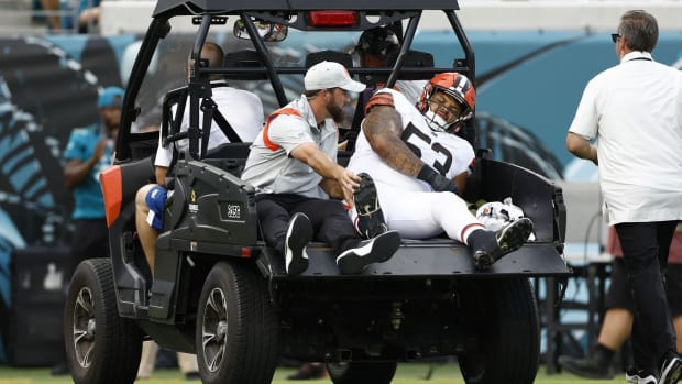 Nick Harris suffered a knee injury two plays into his exhibition opener for the Browns.