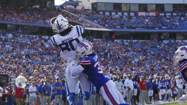 Indianapolis Colts tight end Jelani Woods (80) catches a pass for a touchdown with Buffalo Bills safety Josh Thomas (36) defending during the second half at Highmark Stadium.