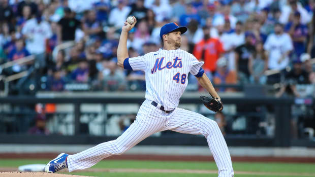 Aug 13, 2022; New York City, New York, USA; New York Mets starting pitcher Jacob deGrom (48) pitches in the first inning against the Philadelphia Phillies at Citi Field.