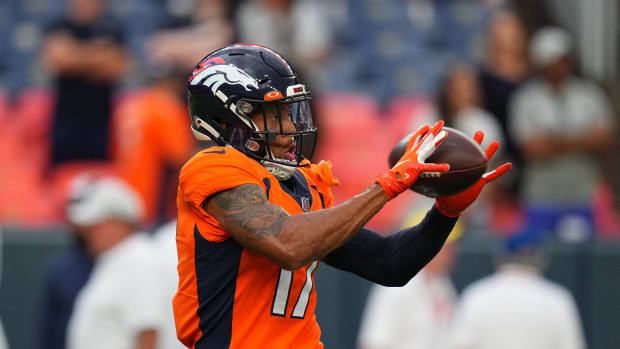 Denver Broncos wide receiver Jalen Virgil (17) warms up before the preseason game against the Dallas Cowboys at Empower Field at Mile High.
