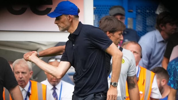 Thomas Tuchel pictured (front) angrily grabbing the hand of Antonio Conte after Chelsea's 2-2 draw with Tottenham in August 2022