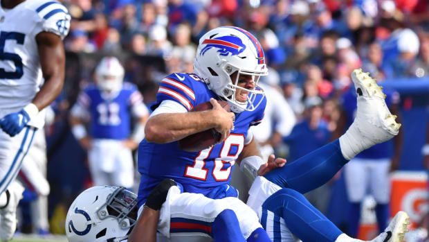 Aug 13, 2022; Orchard Park, New York, USA; Buffalo Bills quarterback Case Keenum (18) is sacked by Indianapolis Colts defensive tackle Curtis Brooks (97) in the second quarter pre-season game at Highmark Stadium. Mandatory Credit: Mark Konezny-USA TODAY Sports