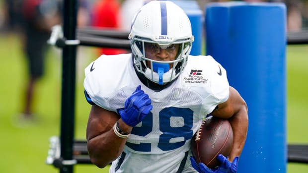 Indianapolis Colts running back Jonathan Taylor (28) runs a drill during practice at the NFL team’s football training camp in Westfield, Ind., Tuesday, Aug. 2, 2022.