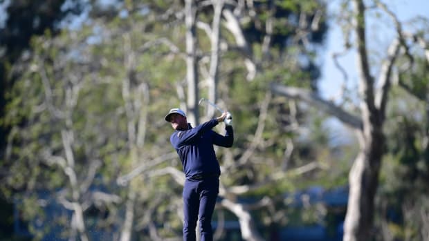Feb 18, 2022; Pacific Palisades, California, USA; Taylor Pendrith plays his shot on the seventeenth fairway during the second round of the Genesis Invitational golf tournament. Mandatory Credit: Gary A. Vasquez-USA TODAY Sports