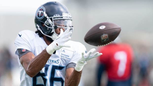 Tennessee Titans wide receiver Josh Malone (86) pulls in a catch during a training camp practice at Ascension Saint Thomas Sports Park Monday, Aug. 15, 2022, in Nashville, Tenn.