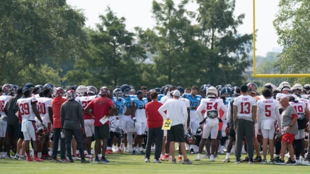 The Tennessee Titans and Tampa Bay Buccaneers meet in the middle of the field during a joint training camp practice at Ascension Saint Thomas Sports Park Wednesday, Aug. 17, 2022, in Nashville, Tenn.