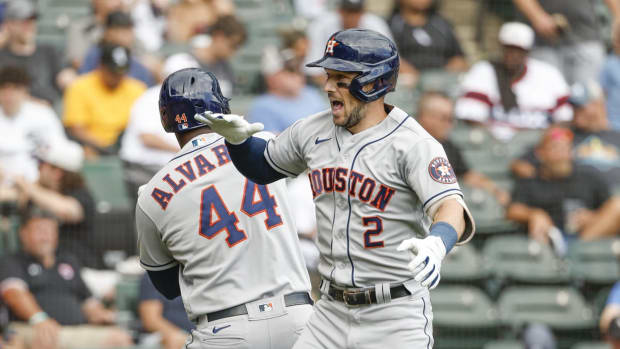 Aug 18, 2022; Chicago, Illinois, USA; Houston Astros third baseman Alex Bregman (2) celebrates with designated hitter Yordan Alvarez (44) after hitting a two-run home run against the Chicago White Sox during the fourth inning at Guaranteed Rate Field. Mandatory Credit: Kamil Krzaczynski-USA TODAY Sports