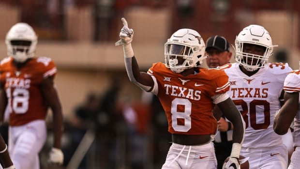 Texas wide receiver Xavier Worthy (8) celebrates a first down during Texas's annual spring football game at Royal Memorial Stadium in Austin, Texas on April 23, 2022.