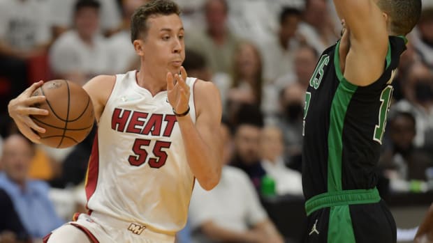 May 25, 2022; Miami, Florida, USA; Miami Heat guard Duncan Robinson (55) drives to the basket against Boston Celtics forward Grant Williams (12) during the first half of game five of the 2022 eastern conference finals at FTX Arena. Mandatory Credit: Jim Rassol-USA TODAY Sports