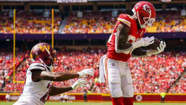 Aug 20, 2022; Kansas City, Missouri, USA; Kansas City Chiefs tight end Jody Fortson (88) catches a pass for a touchdown against Washington Commanders cornerback Kendall Fuller (29) during the first half at GEHA Field at Arrowhead Stadium. Mandatory Credit: Jay Biggerstaff-USA TODAY Sports