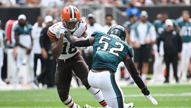 Aug 21, 2022; Cleveland, Ohio, USA; Philadelphia Eagles linebacker Davion Taylor (52) defends against Cleveland Browns wide receiver David Bell (18) during the second half at FirstEnergy Stadium. Mandatory Credit: Ken Blaze-USA TODAY Sports