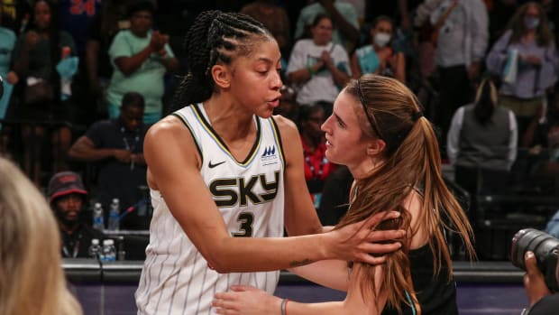 Chicago Sky forward Candace Parker (3) and New York Liberty guard Sabrina Ionescu (20) embrace after game three of the first round at Barclays Center.