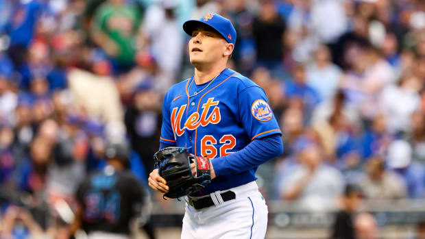 Jun 18, 2022; New York City, New York, USA; New York Mets relief pitcher Drew Smith (62) looks out after ending the seventh inning against the Miami Marlins at Citi Field.