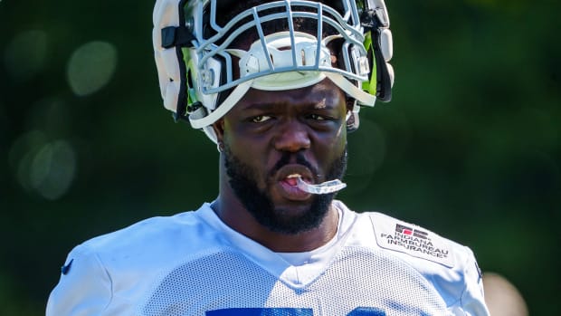 Indianapolis Colts defensive end Kwity Paye (51) prepares to stretch Wednesday, Aug. 24, 2022, before training camp at Grand Park Sports Campus in Westfield, Indiana. Indianapolis Colts Training Camp Wednesday
