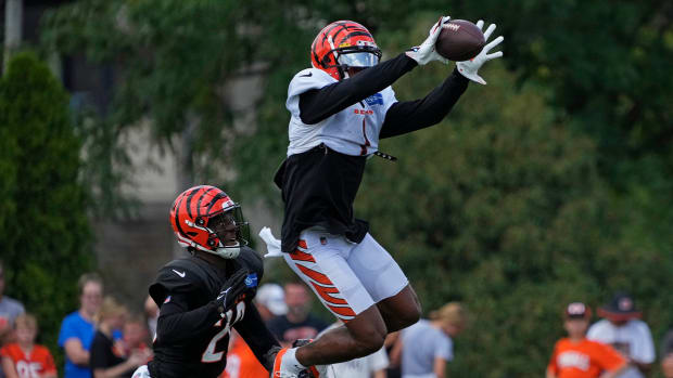 Cincinnati Bengals wide receiver Ja’Marr Chase (1) makes a leaping catch during training camp practice at the Paycor Stadium practice facility in downtown Cincinnati on Wednesday, Aug. 10, 2022. Bengals Training Camp