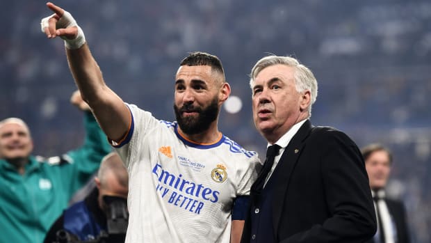 Real Madrid manager Carlo Ancelotti (right) and Karim Benzema pictured together after winning the 2022 Champions League final