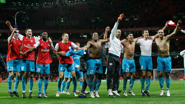 PSV Eindhoven's players pictured celebrating in 2007 after knocking Arsenal out of the Champions League