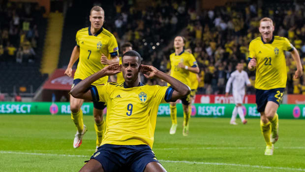 No.9 Alexander Isak pictured celebrating after scoring a goal for Sweden against Spain in September 2021