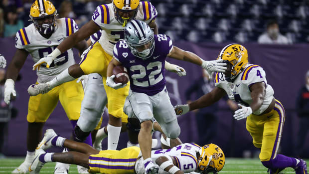 Jan 4, 2022; Houston, TX, USA; Kansas State Wildcats running back Deuce Vaughn (22) runs with the ball during the fourth quarter against the LSU Tigers during the 2022 Texas Bowl at NRG Stadium.