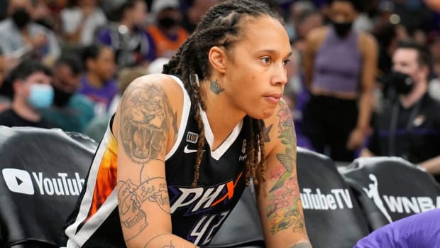 FILE - Phoenix Mercury center Brittney Griner sits during the first half of Game 2 of basketball’s WNBA Finals against the Chicago Sky, Wednesday, Oct. 13, 2021, in Phoenix. Griner is easily the most prominent American citizen known to be jailed by a foreign government. Yet as a crucial hearing approaches next month, the case against her remains shrouded in mystery, with little clarity from the Russian prosecutors. (AP Photo/Rick Scuteri, File)