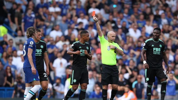 Chelsea midfielder Conor Gallagher (left) pictured receiving a red card from referee Paul Tierney during his team's 2-1 win over Leicester in August 2022