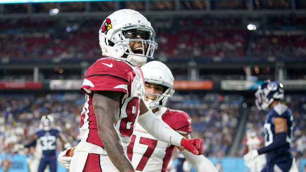 Arizona Cardinals wide receiver Greg Dortch (83) celebrates his touchdown against the Tennessee Titans during the third quarter of an NFL preseason game at Nissan Stadium Saturday, Aug. 27, 2022.
