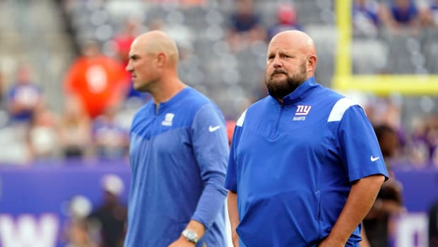 New York Giants head coach Brian Daboll and offensive coordinator Mike Kafka, left, on the field for warmups before a preseason game at MetLife Stadium on August 21, 2022, in East Rutherford.